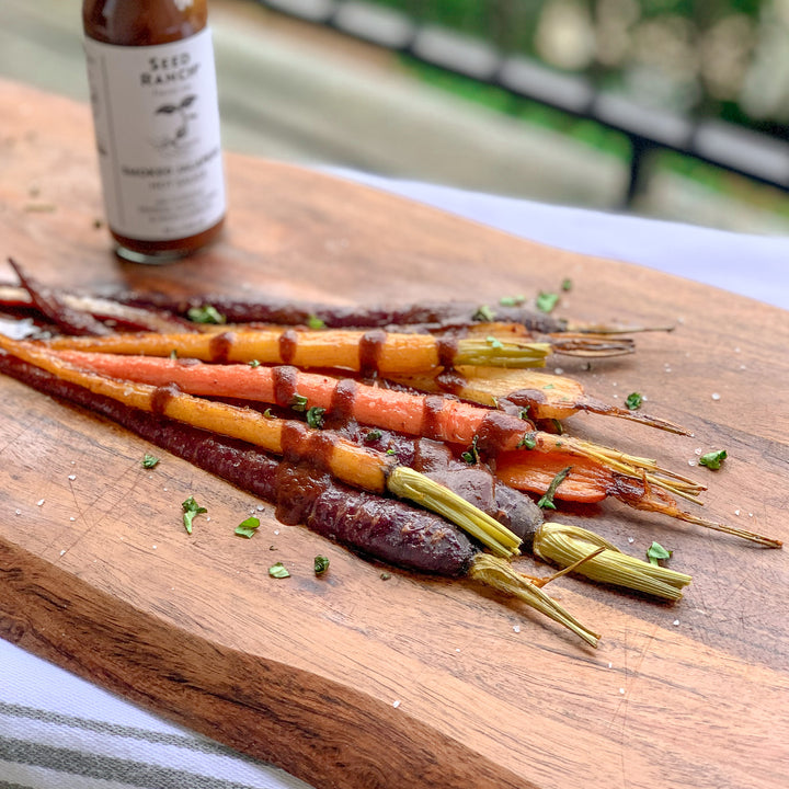 roasted caramelized carrots with chipotle hot sauce