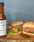Smoky Ghost Hot Sauce on a plant-based burger