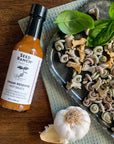 Umami Reserve Hot Sauce on pasta