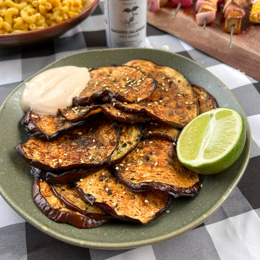 Grilled smoky eggplant slices with chipotle hot sauce
