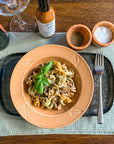 umami reserve hot sauce in plant based pasta dinner