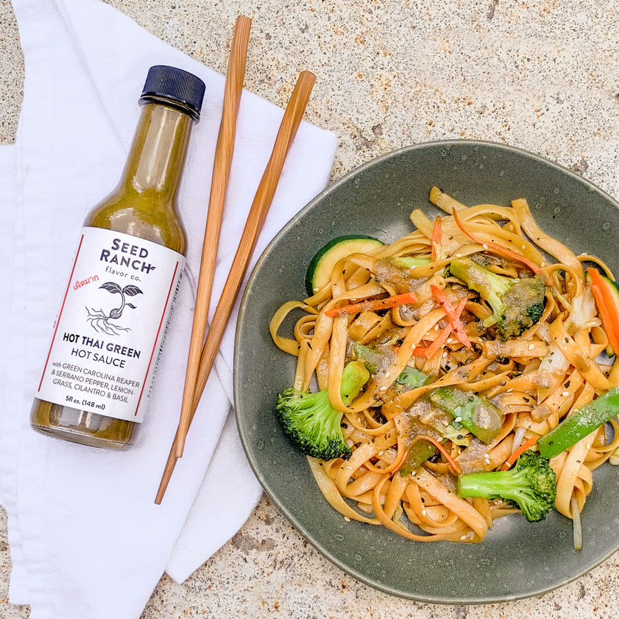 Hot Thai Green Hot Sauce on vegan lo mein noodles